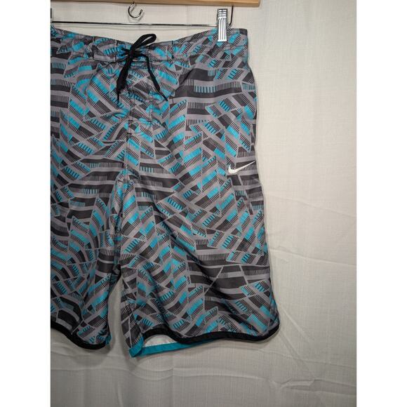 Nike Mens Swim Shorts Trunks L Blue Gray Geometric Print Logo Drawstring Pockets - Picture 2 of 8